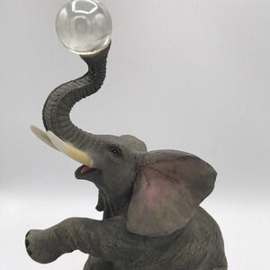 Rare vintage Montefiori Collection elephant figurine with crystal ball